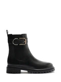 Bota negra de piel y hebilla